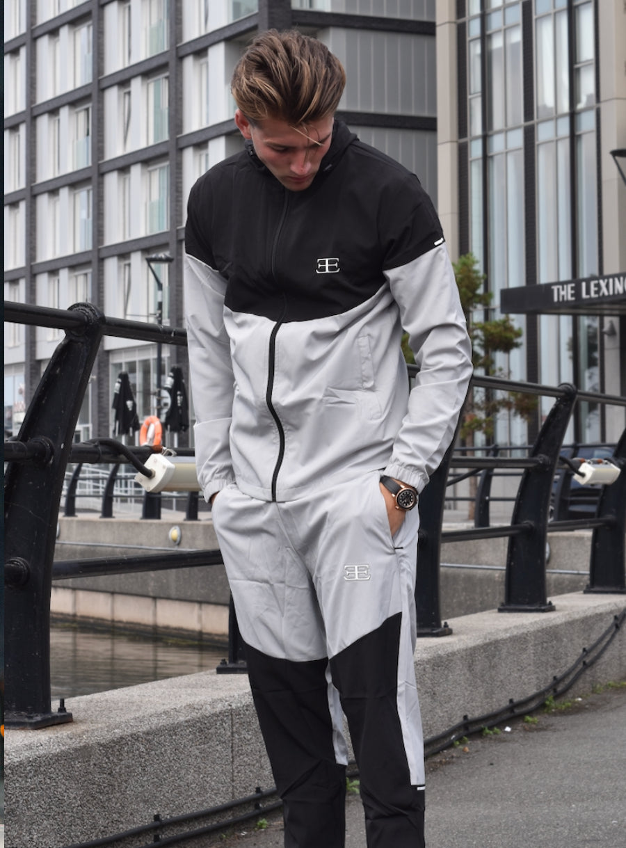 Man wearing Black and Grey Tracksuit Set, jacket with joggers