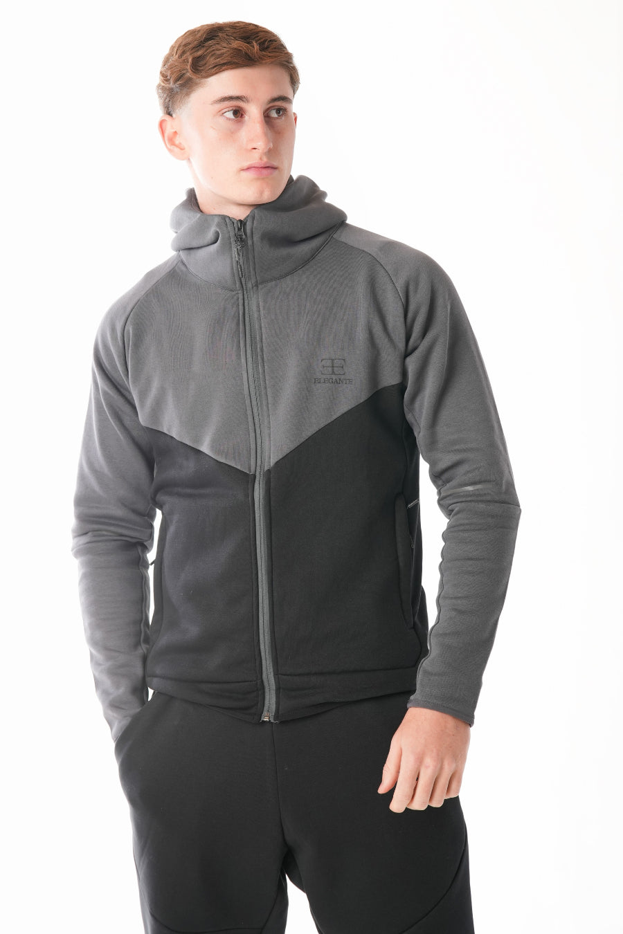 Man wearing Black steel grey Tracksuit on white background