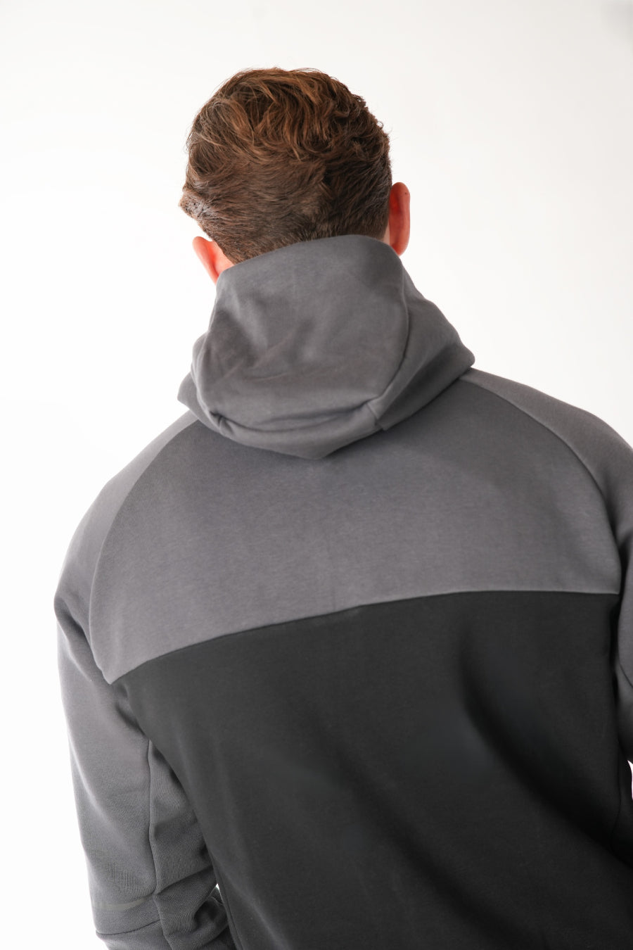 Man wearing Black steel grey Tracksuit on white background