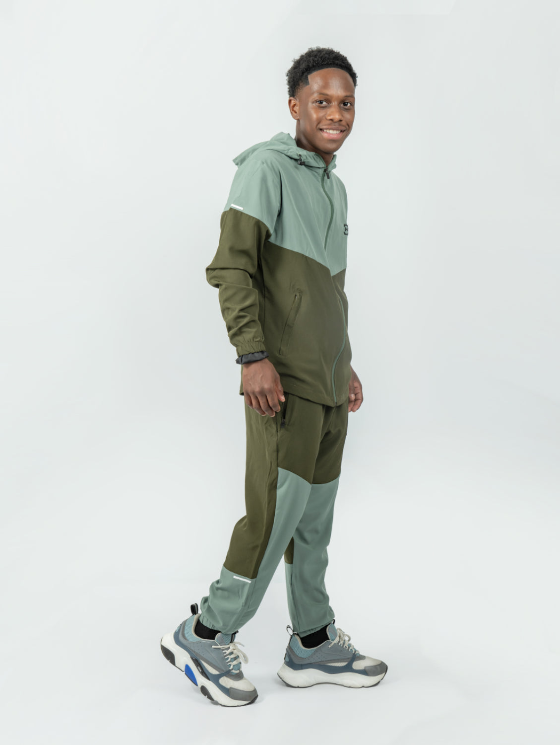 man wearing olive green Tracksuit jogger, mens sports tracksuit sets, activewear, gym wear clothing