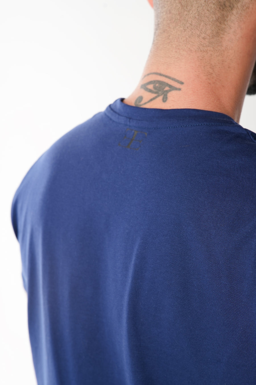 man wearing navy t-shirt